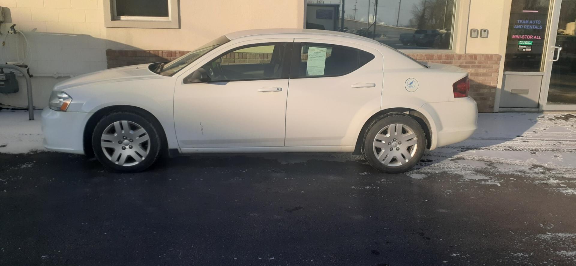 2013 Dodge Avenger SE (1C3CDZAG1DN) with an 3.6L V6 DOHC 24V FFV engine, 6-Speed Automatic transmission, located at 2015 Cambell Street, Rapid City, SD, 57701, (605) 342-8326, 44.066433, -103.191772 - Photo#0